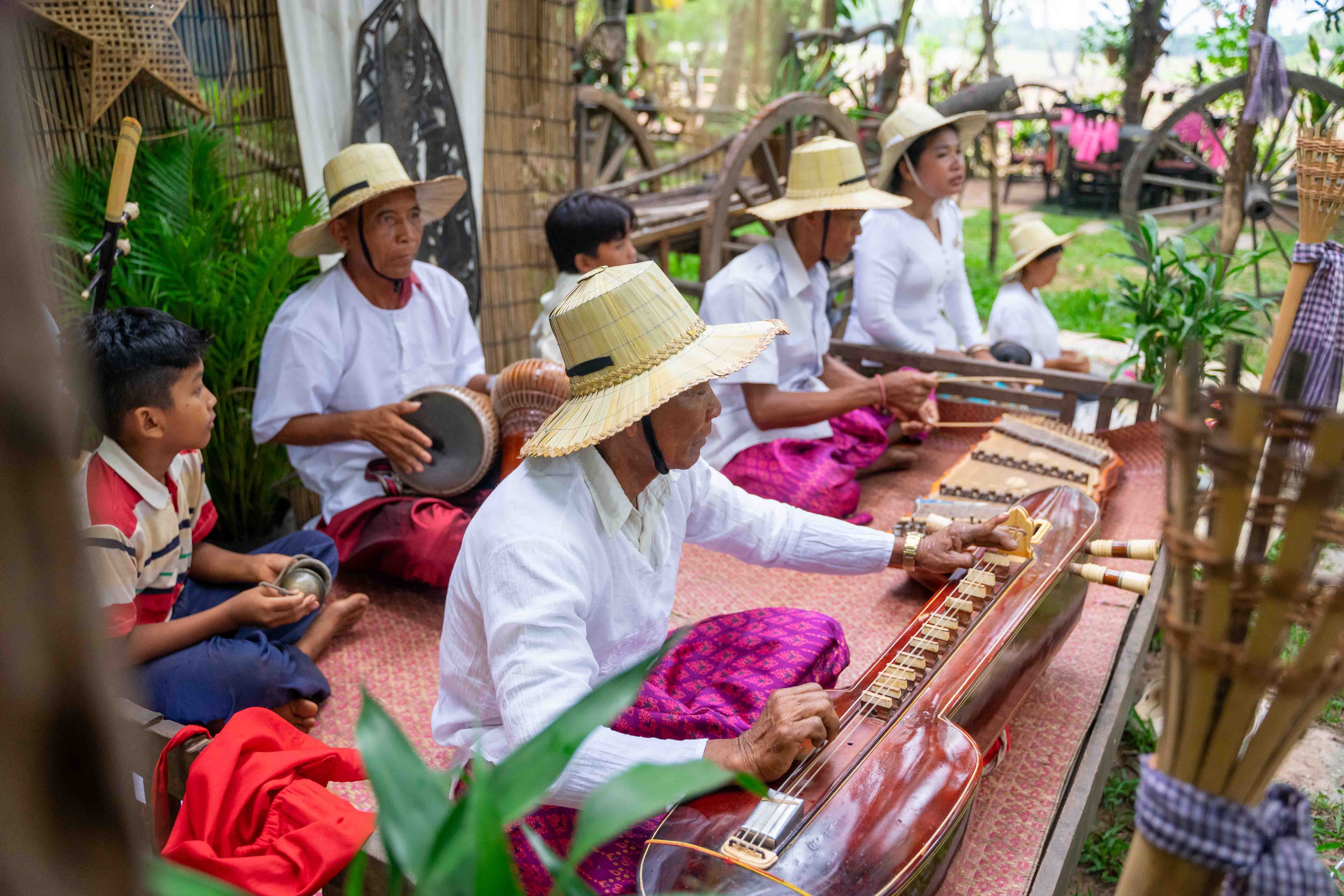 Traditional Khmer Music Performance in Preah Dak Village Traditional Khmer musicians performing outdoors in Preah Dak community, Siem Reap countryside
